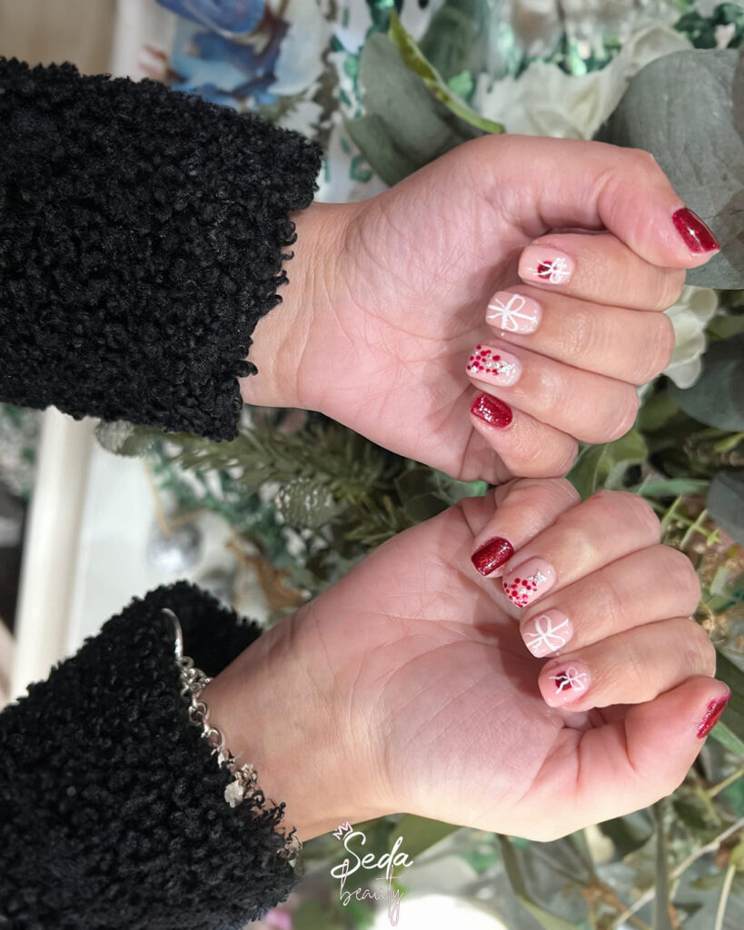 Christmas nail art designs featuring festive colours and elegant details for a stylish holiday look.