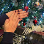 Christmas nail trends showcasing festive colours, elegant designs and stylish seasonal manicure ideas.