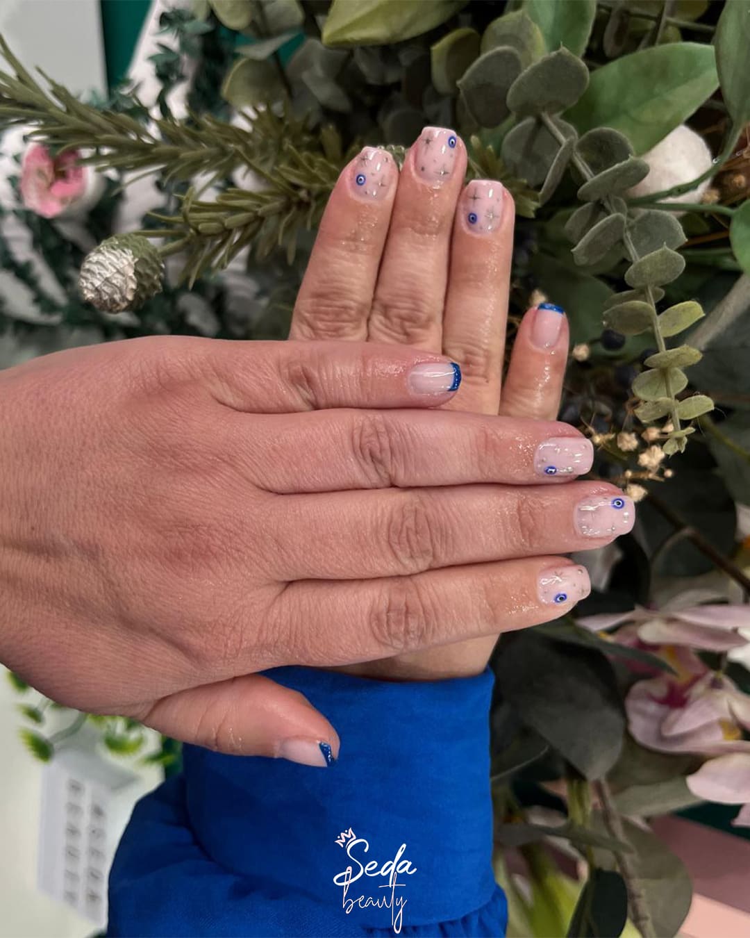 Embrace the latest nail shape trends with versatile coffin tips that effortlessly complement any outfit.