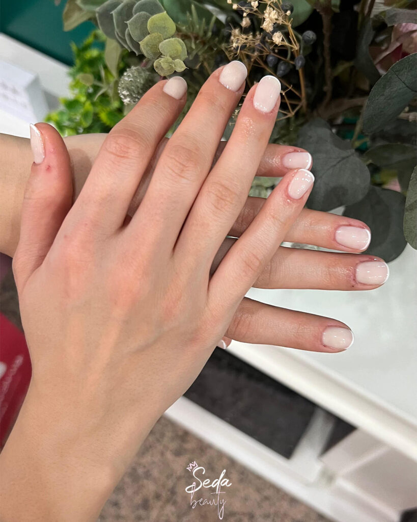 Romantic acrylic nails add a soft, elegant touch to any look, perfect for special moments.