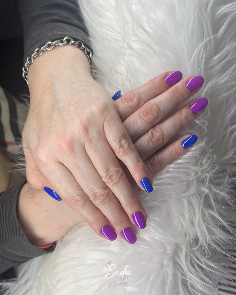 Colourful nail designs featuring vibrant shades, playful patterns and bold styles for a lively manicure look.